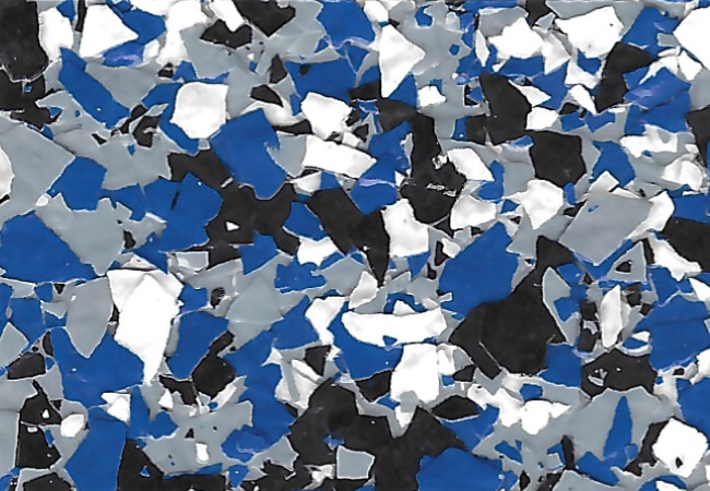 Abstract terrazzo-like pattern with blue, white, gray, and black irregular chips.