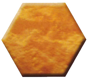 Orange-brown marbled hexagonal tile, close-up.